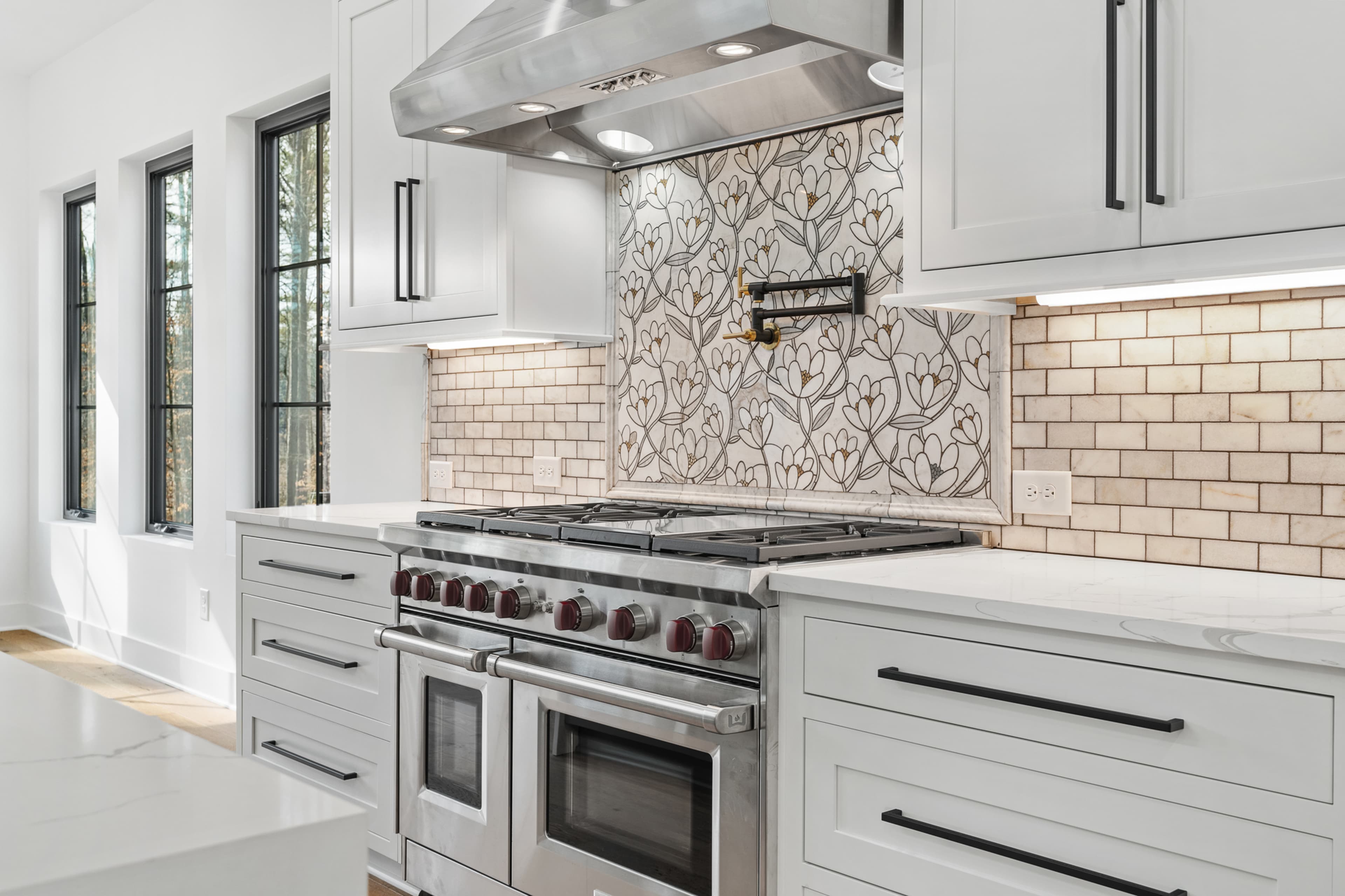Pro range with magnolia tile backsplash